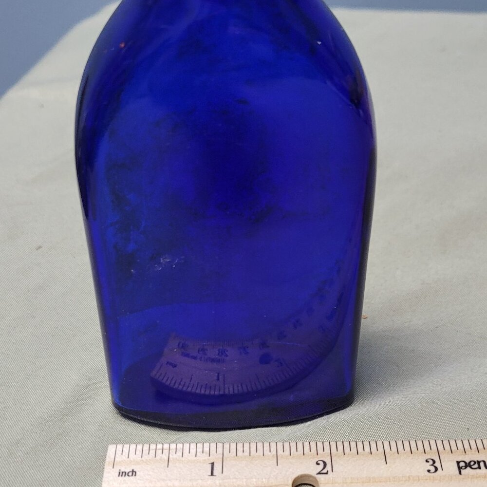 Vintage Maryland circle medicine bottle